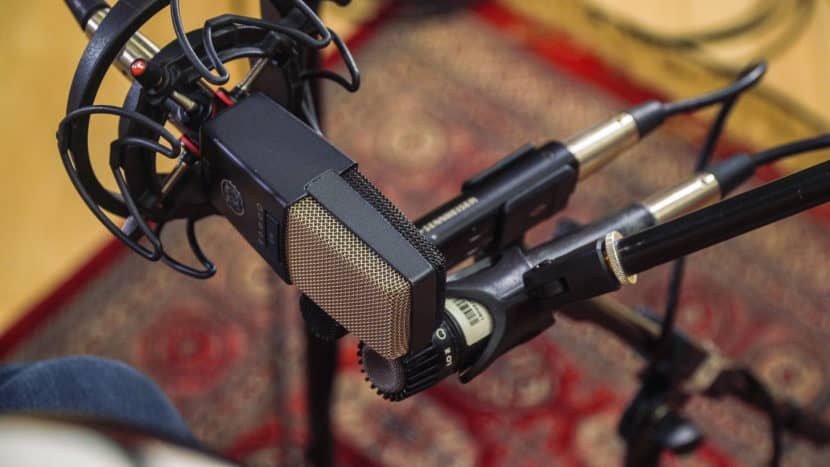 Three microphones lined up side by side on stands for the preamp comparison