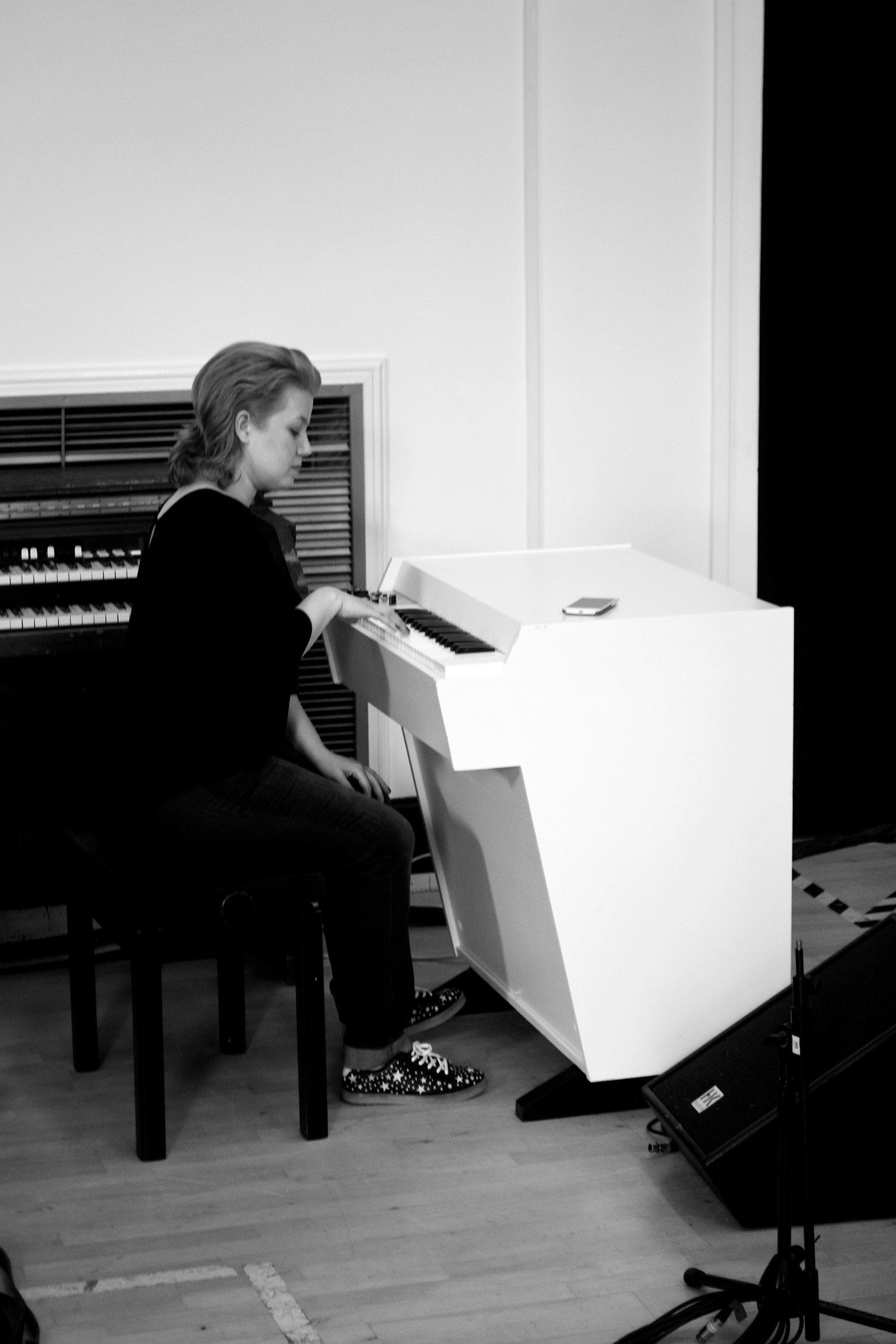 Mary Epworth playing the Mellotron, with a Hammond organ in the background, black and white