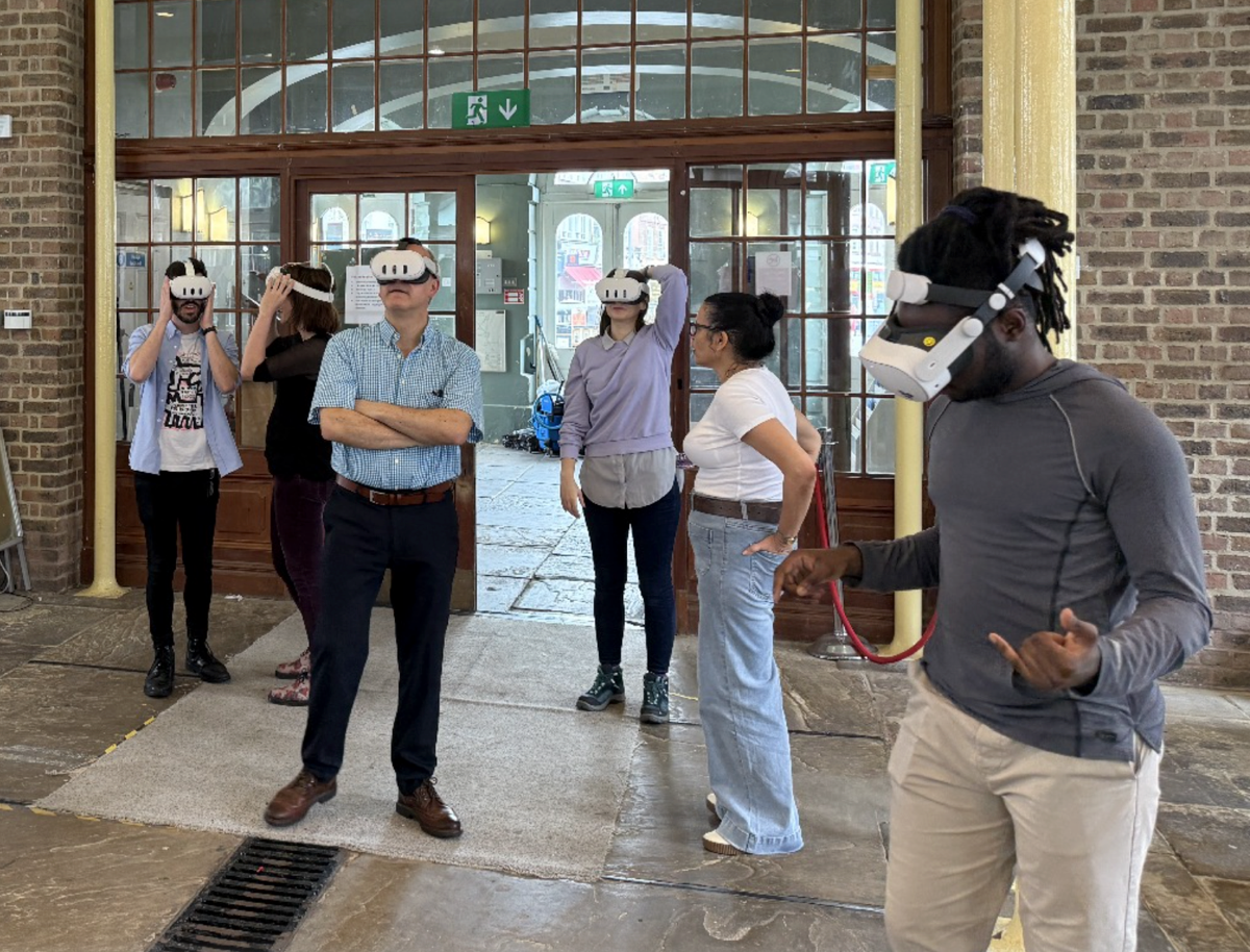 Participants in VR headsets experiencing the immersive King Æthelstan project