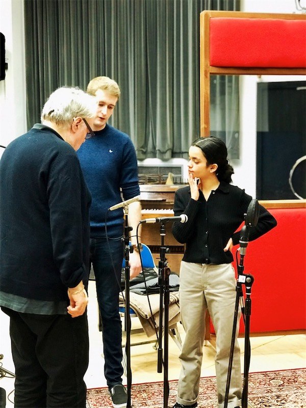 Engineers and interns setting up microphones with producer Chris Kimsey
