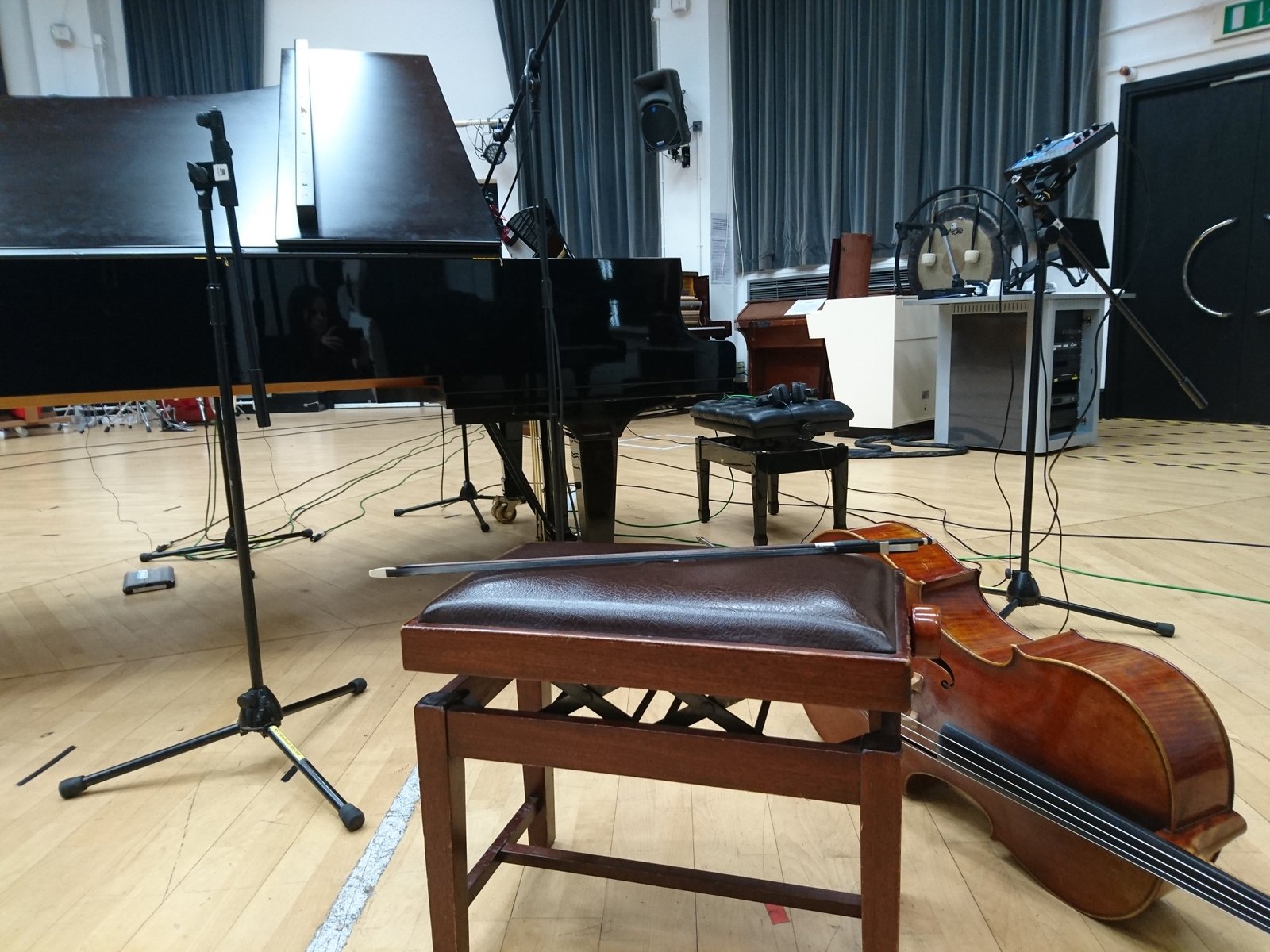 Grand piano and double bass in natural light in the live room