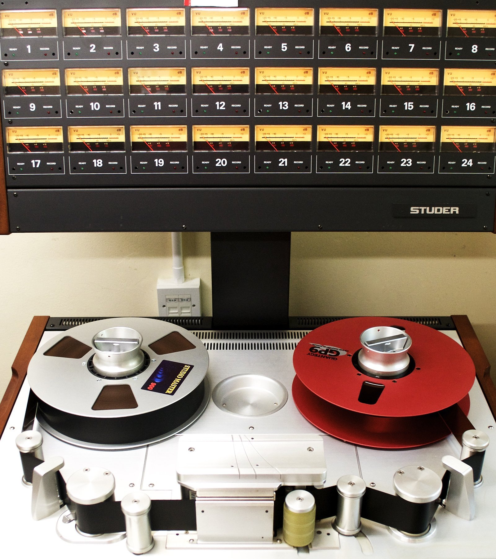 The Studer A827 24-track tape machine loaded with a red reel of 2-inch tape